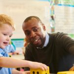 Teacher with young boy