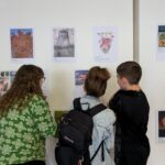 Jo Siney at art exhibition with children