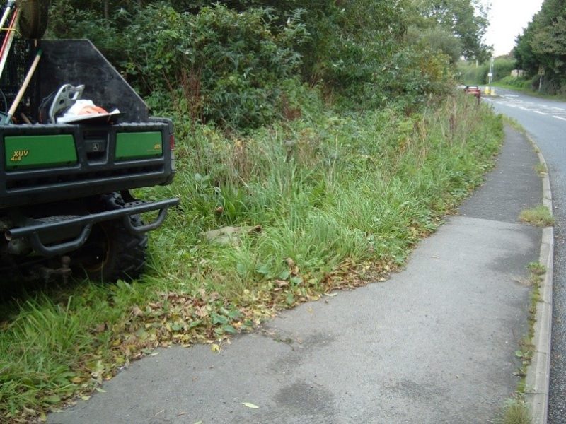 flail cutting along pavement into Knowle