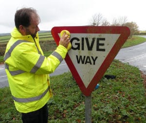 Upton Pyne self help - sign cleaning