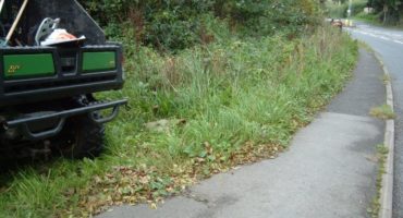 flail cutting along pavement into Knowle