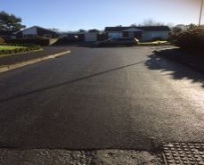 estate road, shepherds meadow on summers day at