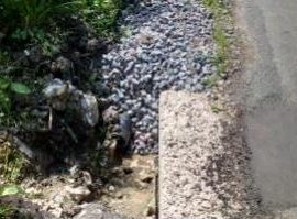 concrete ditch with drain