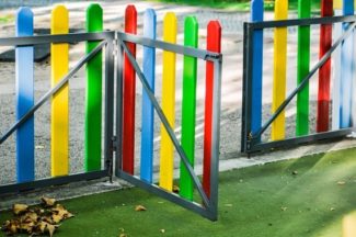 brightly coloured gates in a school playground