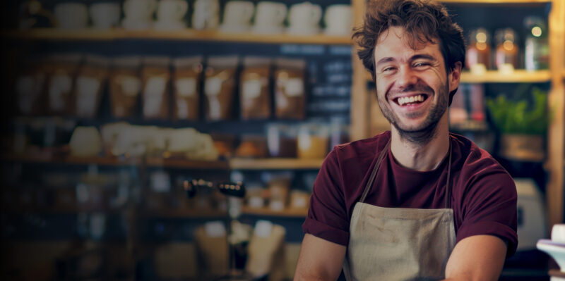 man smiling in shop