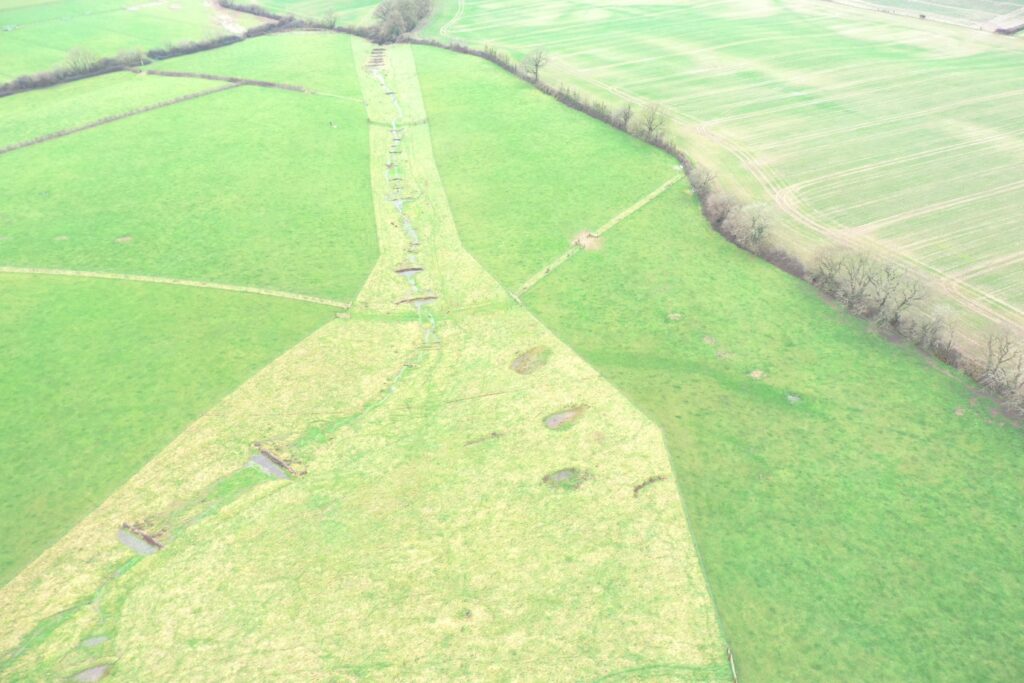 Aerial image of a field with a series of interconnected ponds
