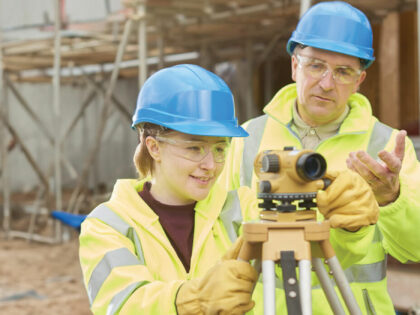 two people wearing hi vis jackets