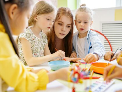 children and nursery teacher