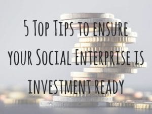 Image of coins stacked in a pile with the title '5 Top Tips to ensure your Social Enterprise is investment ready