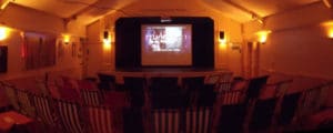 Croyde Deckchair cinema screen and chairs in foreground