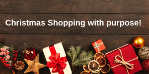 Image of Christmas parcels and decorations with the title 'Christmas Shopping with purpose!'