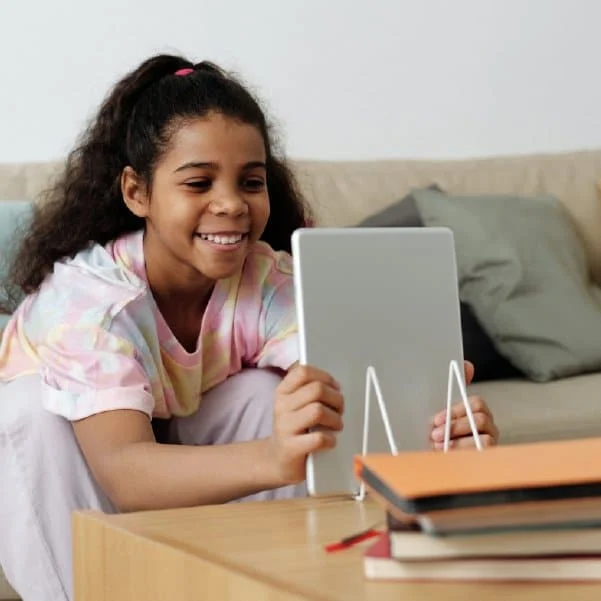 girl looking at tablet