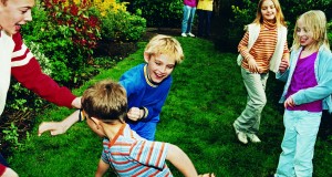 Children playing in a garden