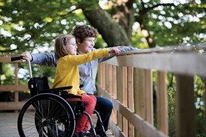 a girl in a wheelchair