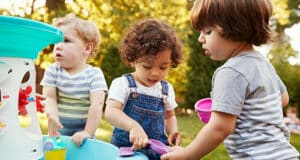 Young children playing outside