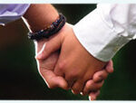 picture of men holding hands