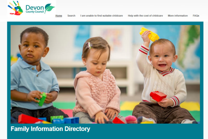 Image of the home page for the Find Childcare website. There are three toddlers sat on the floor playing with coloured blocks.