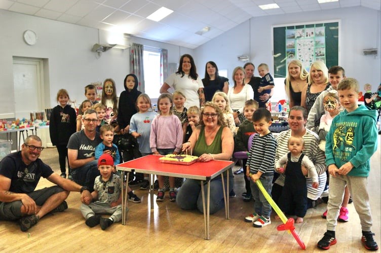 Claire Marshall Tucker the Manager of Bow Bears pre-school celebrating with children and families at an event to celebrate the setting turning 50 this year!