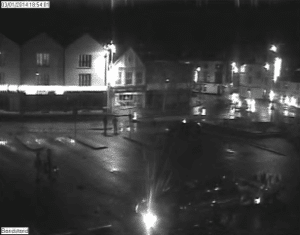 CCTV image of 3 January 2014, Kingsbridge town square with volunteers and “slow flood” and “road closed” signs