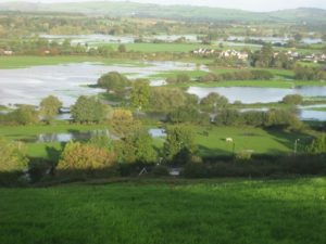 Photo showing flooding across fields in Devon