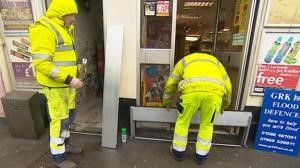 Photo of flood wardens installing PFR