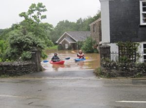 Photo of residents in floods at Tree Corner