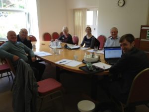 Photo of training in a office with Ottery St Mary Flood Group