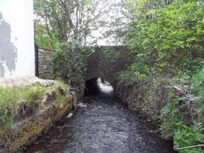 Photo showing Willhayes original restrictive culvert