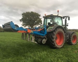 A tractor undertaking tackling soil compaction methods