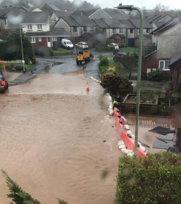 An image of a flooded road in Ivybridge, Devon, as a result of storms in 2020.