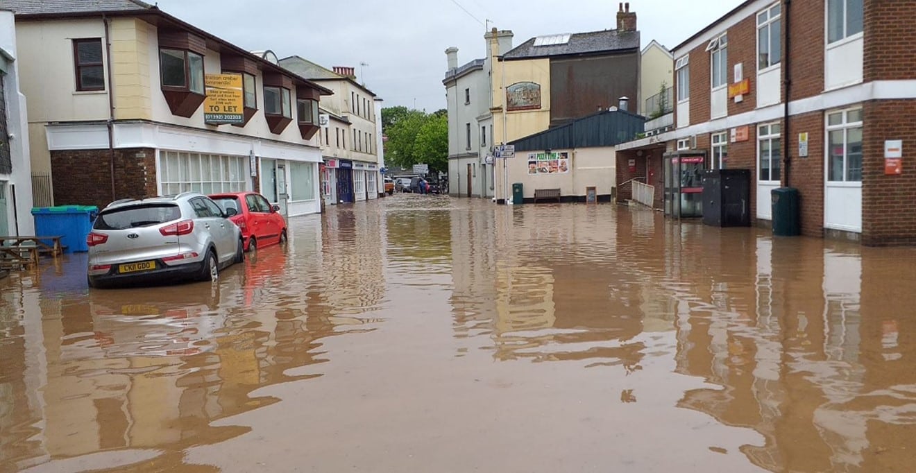 A photograph of a flooded street in Kingsbridge, Devon.