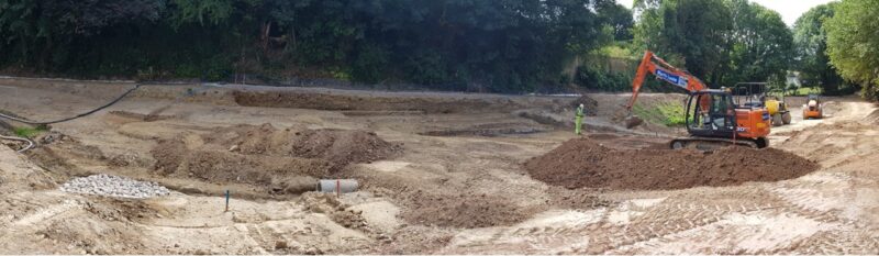 Construction site with bunds being built