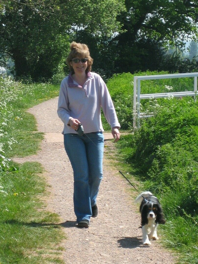 Photo taken by Jo Roberts Lady walking her dog by Tiverton Road Bridge