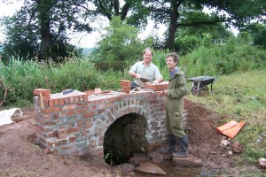 Waterway Recovery Group volunteers repairing brickwork on a culvert