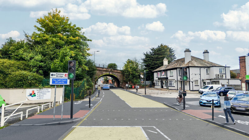 An Artistic Impression of Pinhoe Road Active Travel Crossing Option 2. A toucan crossing across Pinhoe Road east of Posloe Bridge with advisory cycle lanes on the westbound approach to the junction.