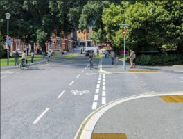 Image shows a visualisation of the proposed plan, looking towards Princesshay. This includes raised crossings across side roads, cycle lanes and pavements. 