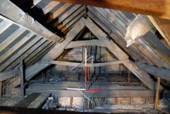 Former Rose and Crown, Barnstaple. One of surviving 16th or 17th century cruck trusses in roof (looking E, 2 x 1m scales). Copyright COAS Ltd.