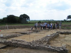 Steve Reed leads a tour of the excavations at Batsworthy Cross (© Bill Horner)