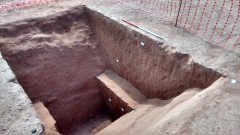 A section across the main enclosure ditch. At over 3 metres wide and 2 metres deep, this would have been a substantial feature in the landscape. Photo: Cotswold Archaeology 