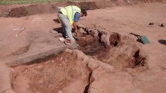 One of several grain drying ovens under excavation. Photo: Cotswold Archaeology 