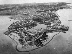 Anti-invasion barbed wire apron crossing the estuarine silts around the docks at The Point, Exmouth. NMR SX 9980/17 MSO 31241/46 14-AUG-41. Historic England (RAF Photography). 