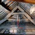 Former Rose and Crown, Barnstaple. One of surviving 16th or 17th century cruck trusses in roof (looking E, 2 x 1m scales). Copyright COAS Ltd.