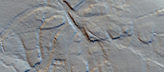 Greyscale lidar imagery showing raised areas either side of incised roadways.