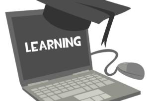 image of computer with the word "Learning" on the screen