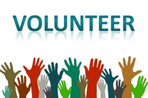 image with the word volunteer and beneath that raised hands