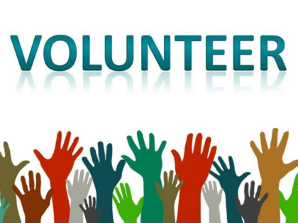 image with the word volunteer and beneath that raised hands
