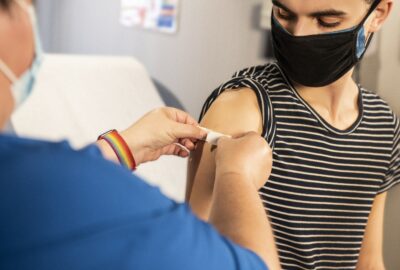 young person being vaccinated