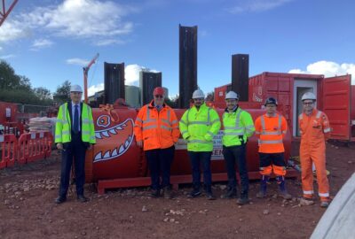 Photo of Councillor Hart at the site of work starting on the district heating network tunnel