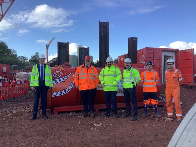 Photo of Councillor Hart at the site of work starting on the district heating network tunnel