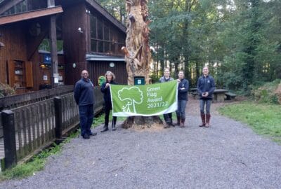 Photo of Stover Country Park staff with the Green Flag Award